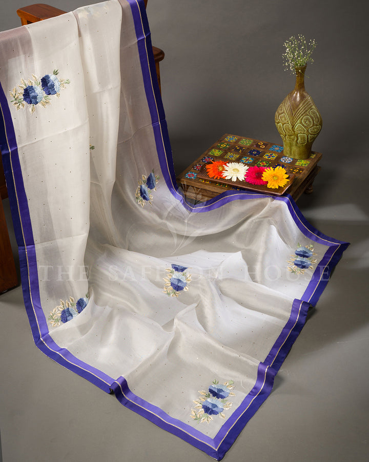 Ivory Tussar Silk Saree with Blue Floral Embroidery & Contrast Blue Blouse
