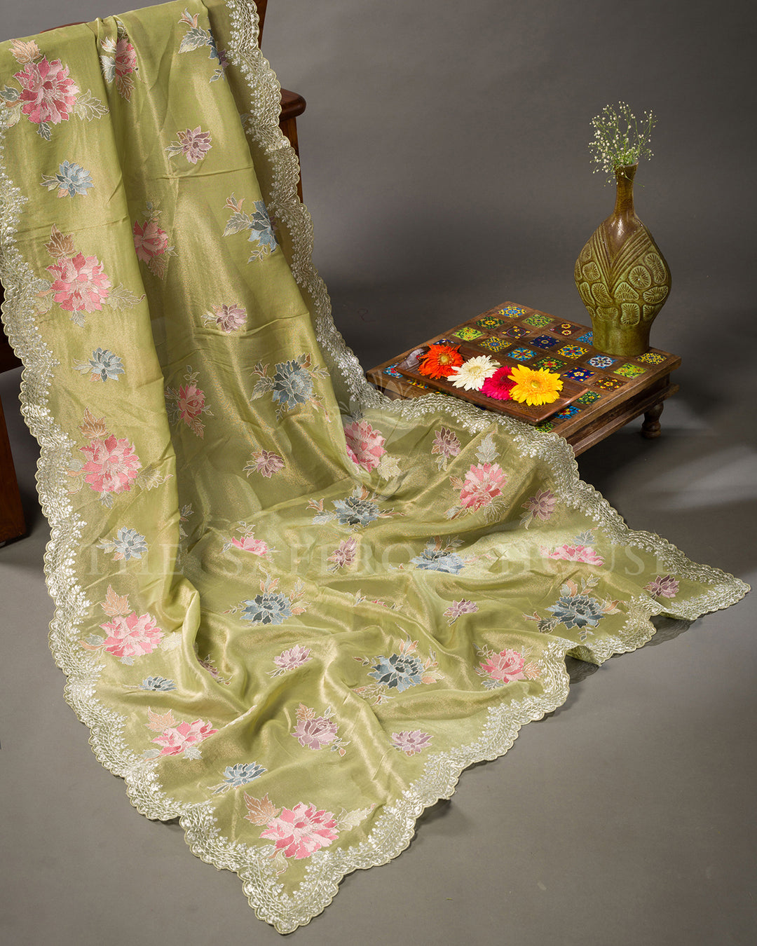 Green Tissue Organza Saree with Multicolor Floral Motifs & Scalloped Lace Border