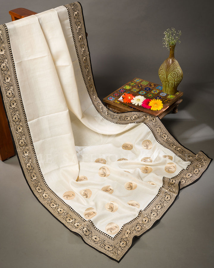 Ivory Tussar Silk Saree with Bird Motif Butis & Contrast Black Zari Border