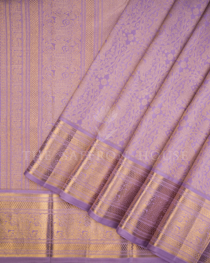 Lavender Kanchivaram Silk Saree with Woven Peacock Motif Border