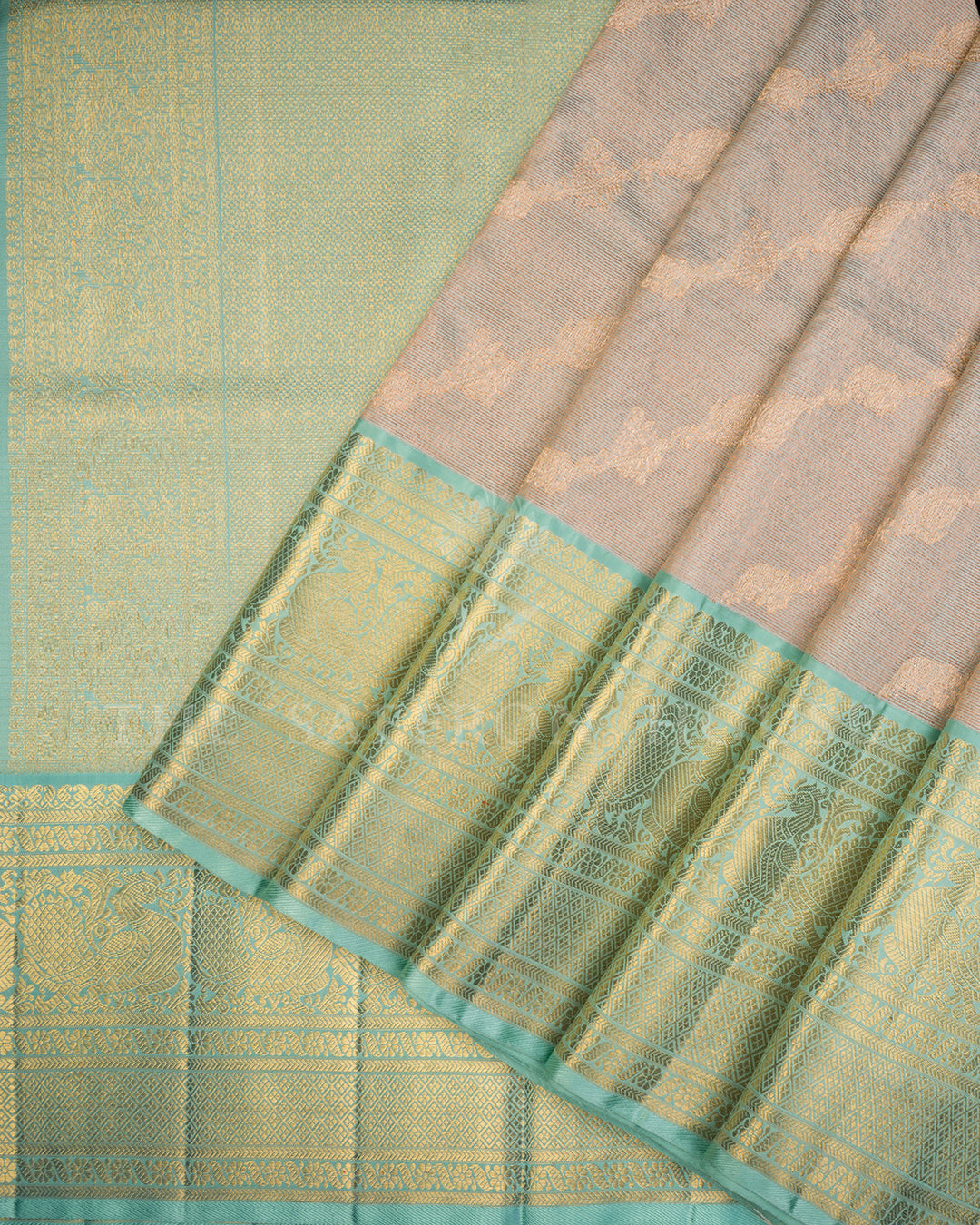 Sea Green Kanchivaram Silk Saree with Diagonal Gold Zari Weave & Peacock Motif Border