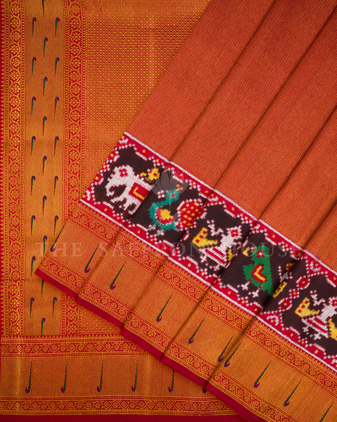 Rust Red Kanchivaram Silk Saree with Ikat Elephant-Peacock Panel & Peacock Feather Border