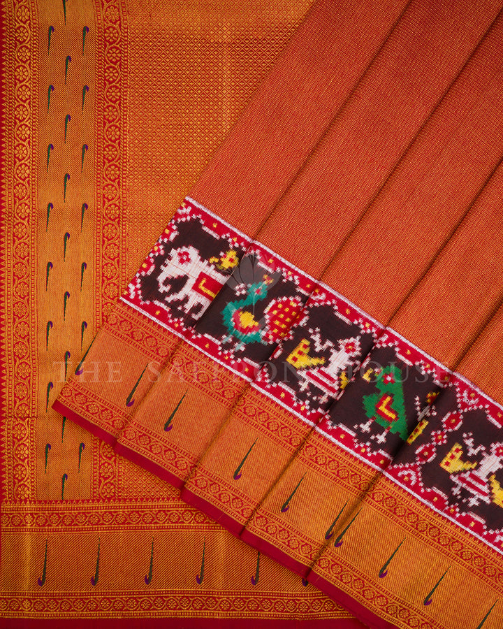 Rust Red Kanchivaram Silk Saree with Ikat Elephant-Peacock Panel & Peacock Feather Border