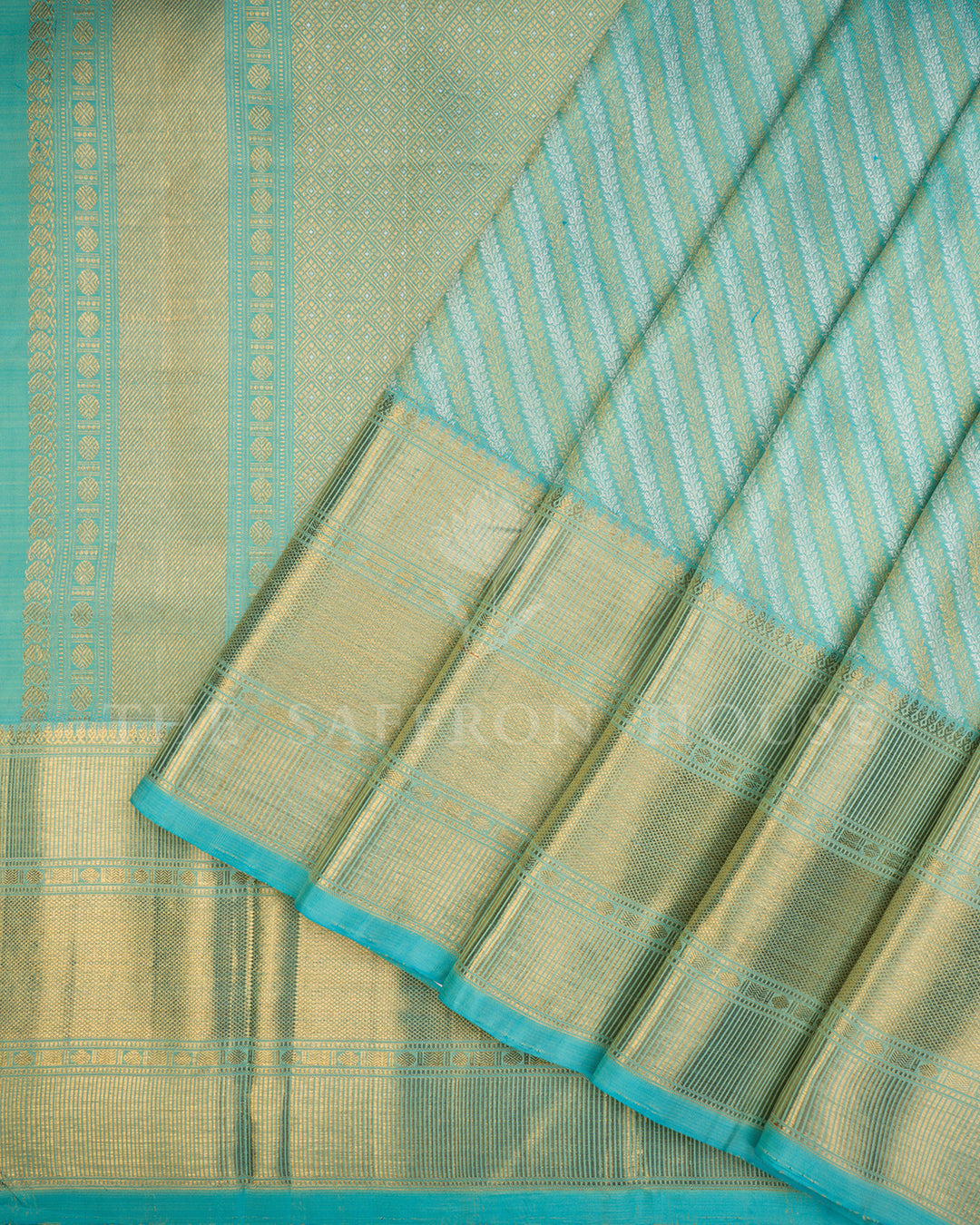 Sky Blue Kanchivaram Silk Saree with Diagonal Gold Zari Stripe Weave & Wide Textured Border