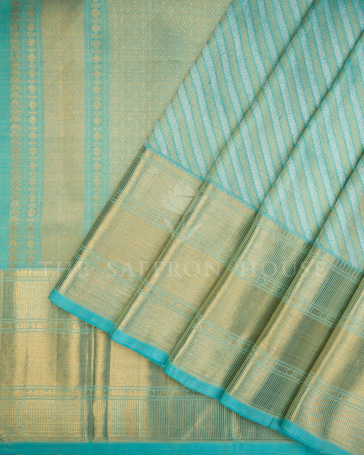 Sky Blue Kanchivaram Silk Saree with Diagonal Gold Zari Stripe Weave & Wide Textured Border