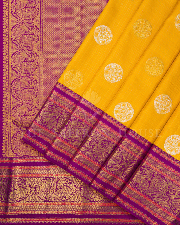 Yellow Kanchivaram Silk Saree with Silver Medallion Buti & Magenta Peacock Border