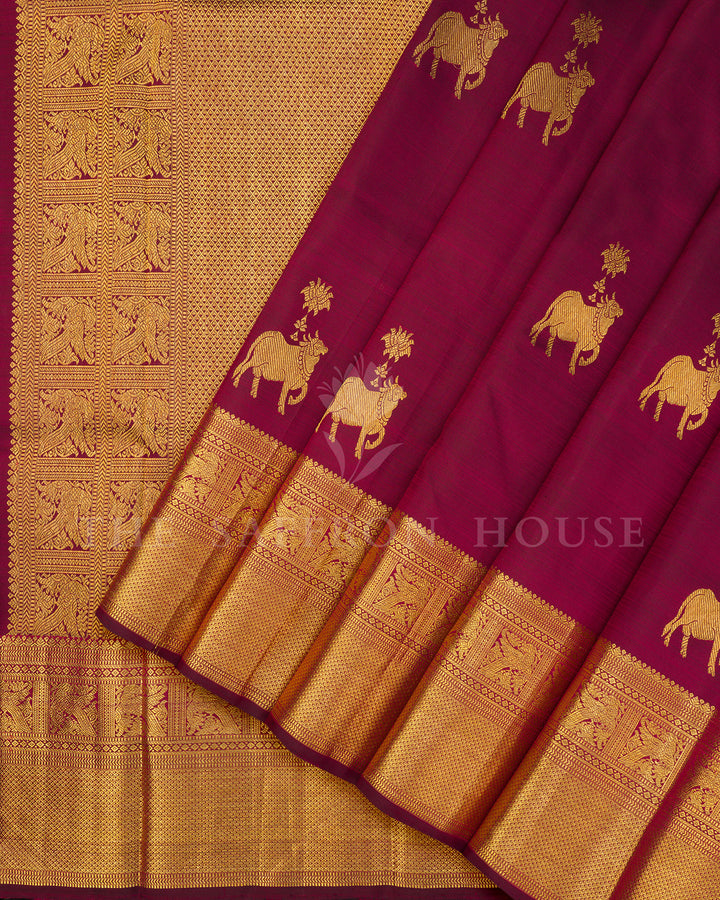 Magenta Kanchivaram Silk Saree with Gold Zari Elephant Motifs, Wide Gold Border