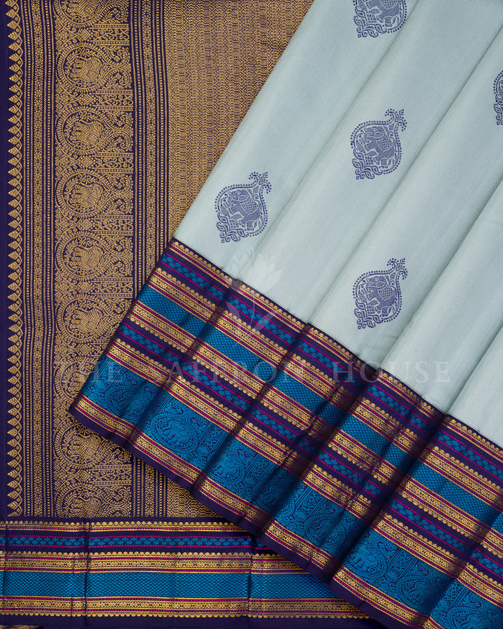 Powder Blue Kanchivaram Silk Saree with Navy Elephant Buttis, Multicolor Border