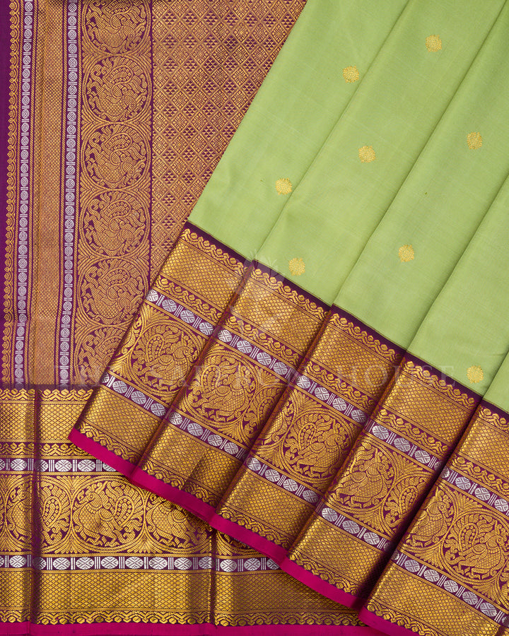 Pista Green Kanchivaram Silk Saree with Gold Zari Buttis, Wine Peacock Border