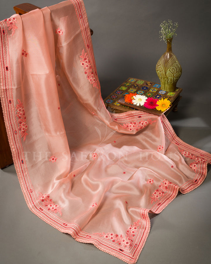 Peach Organza Saree with Floral Thread Embroidery, Mirror Work and Crochet Lace Border