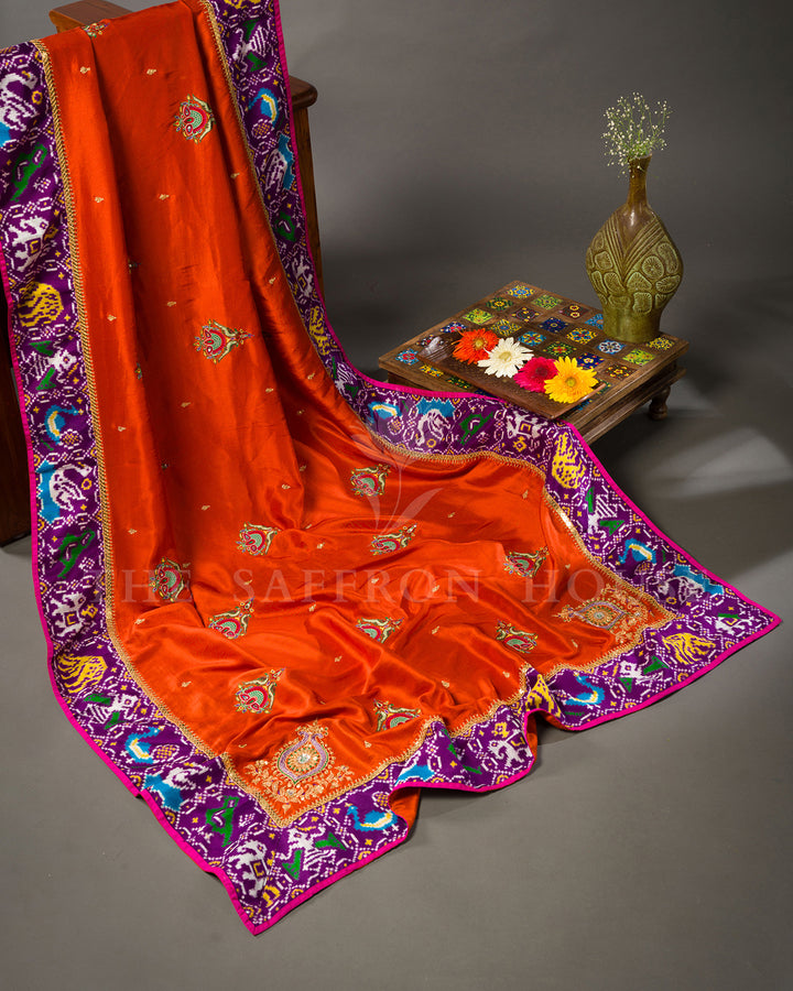 Marigold Orange Tussar Silk Saree with Ikat Fusion Border and Zardosi Buttas