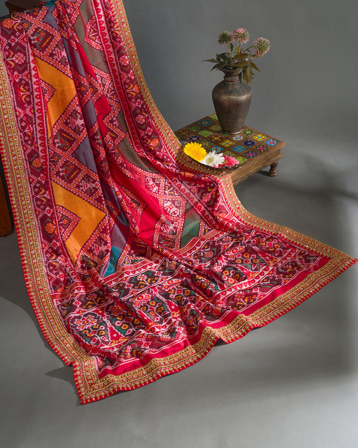 Red Hand Embroidered Border Ikat Silk Saree