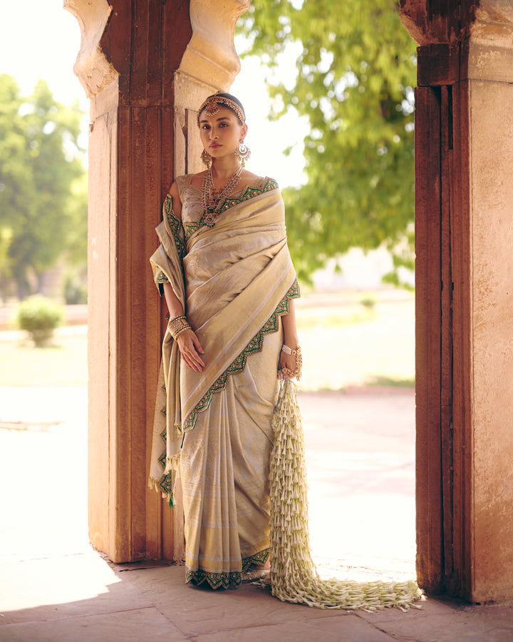 Silver Pure Kanjivaram Silk Saree with Emerald Green Zardozi & Mirror Work Border