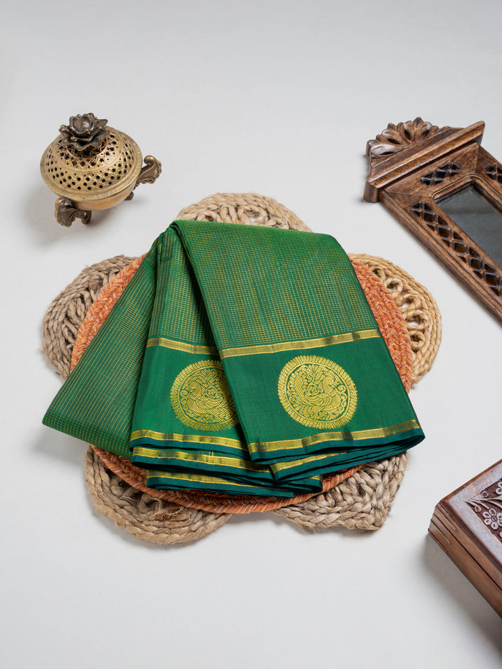 Bottle Green & Gold Kanchivaram Silk Saree | Gold Zari Kattam Body, Coin Floral Jaal Pallu & Peacock Medallion Border