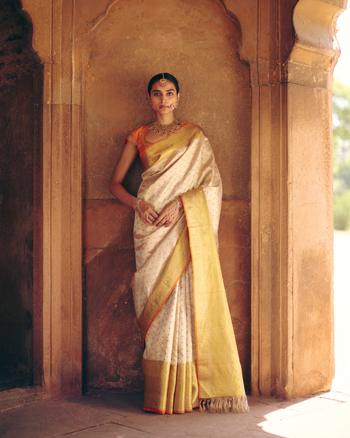 Cream Pure Kanjivaram Silk Saree with Gold Zari Sunflower Buttas & Broad Antique Gold Zari Border