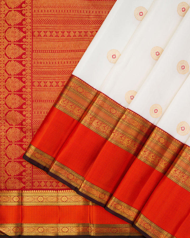 White Kanchivaram Silk Saree with Maroon Zari Pallu & Orange Chevron Border