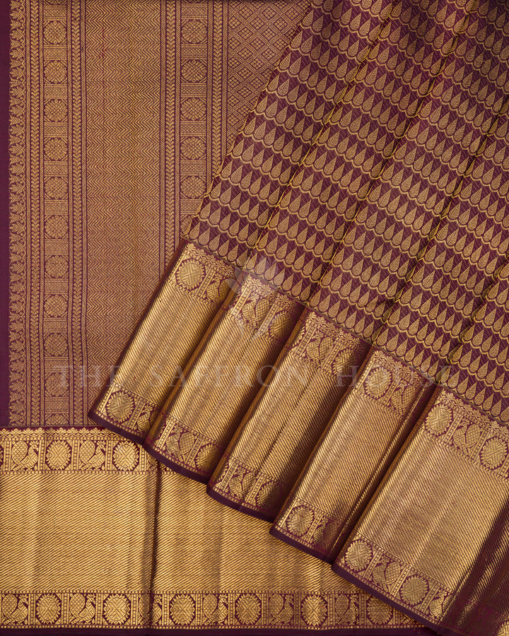 Burgundy Kanchivaram Silk Saree with Gold Leaf Weave & Peacock Border
