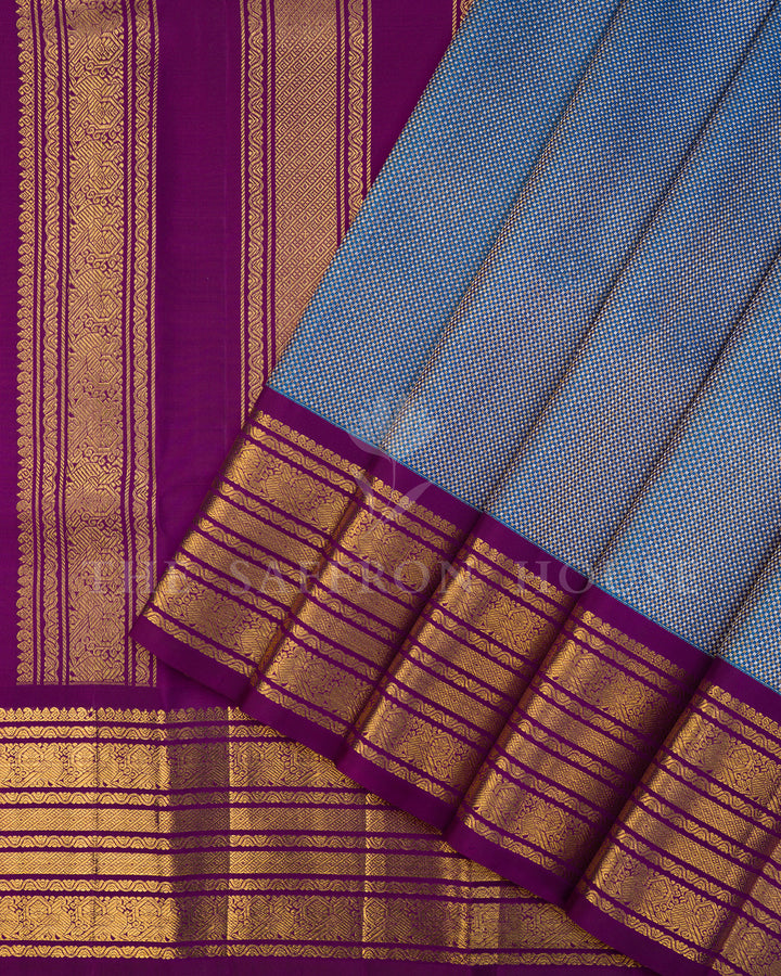 Peacock Blue Kanchivaram Silk Saree with Purple Zari Striped Border
