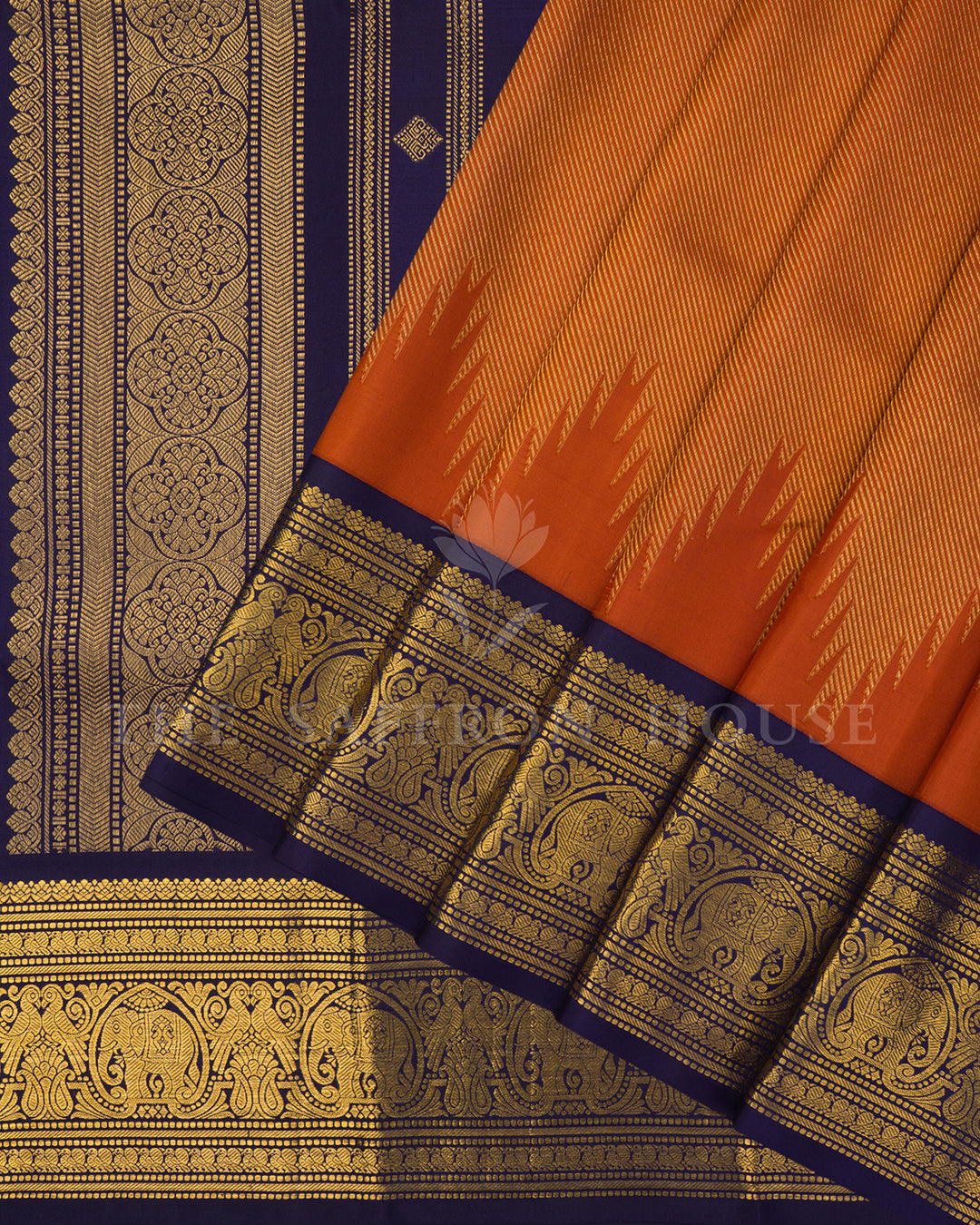 Rust Orange Kanchivaram Silk Saree with Navy Zari Elephant Border