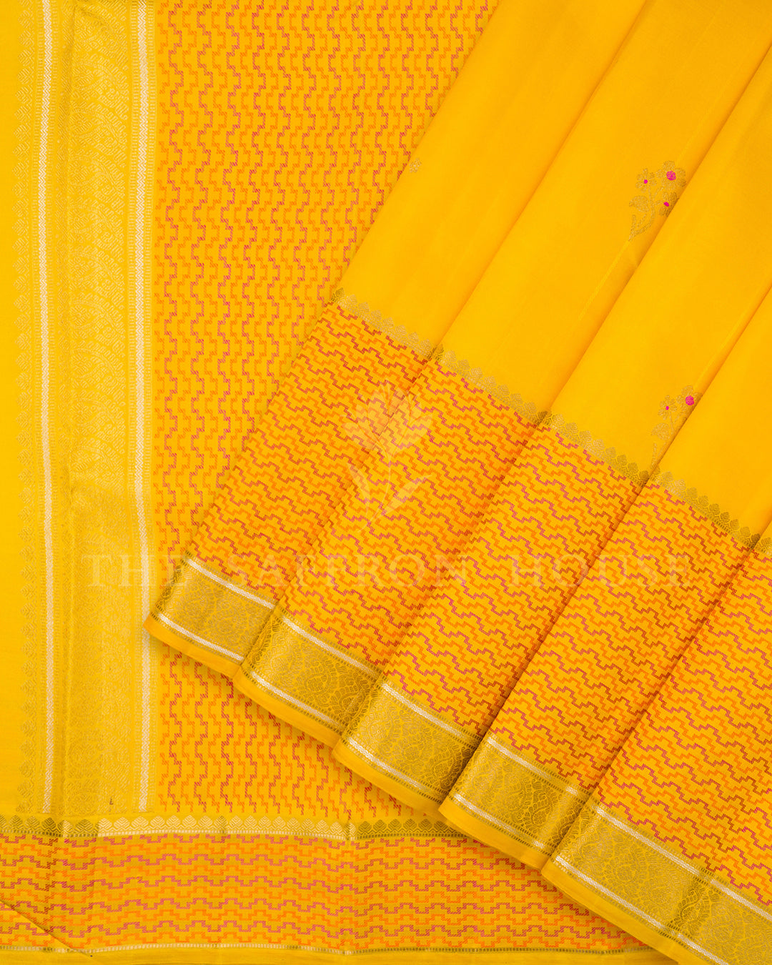 Yellow Kanchivaram Silk Saree with Scattered Zari Butis & Pink-Orange Chevron Border