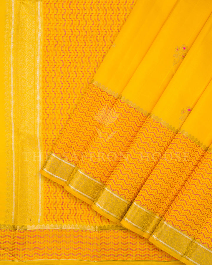 Yellow Kanchivaram Silk Saree with Scattered Zari Butis & Pink-Orange Chevron Border
