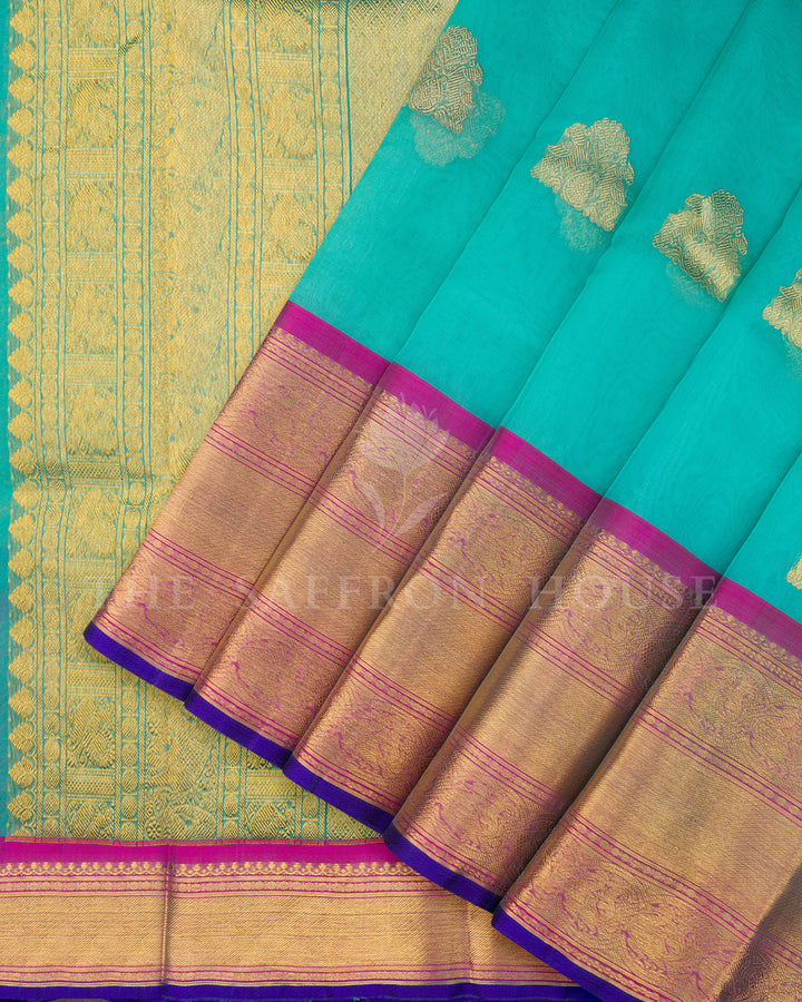 Turquoise Kora Kanchivaram Silk Saree with Gold Zari Butis & Magenta-Blue Contrast Border