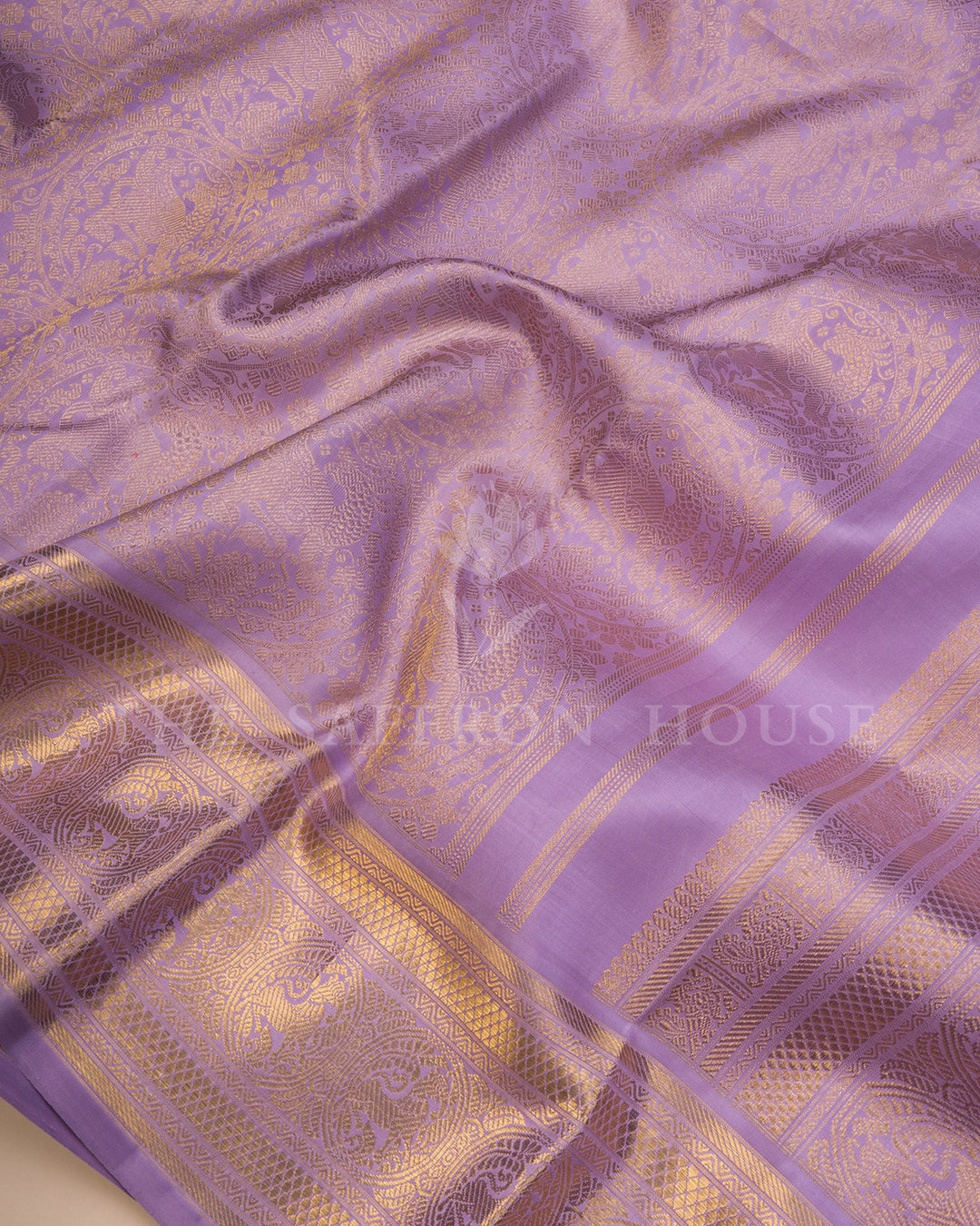 Lavender Kanchivaram Silk Saree with Woven Peacock Motif Border
