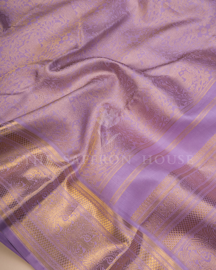 Lavender Kanchivaram Silk Saree with Woven Peacock Motif Border