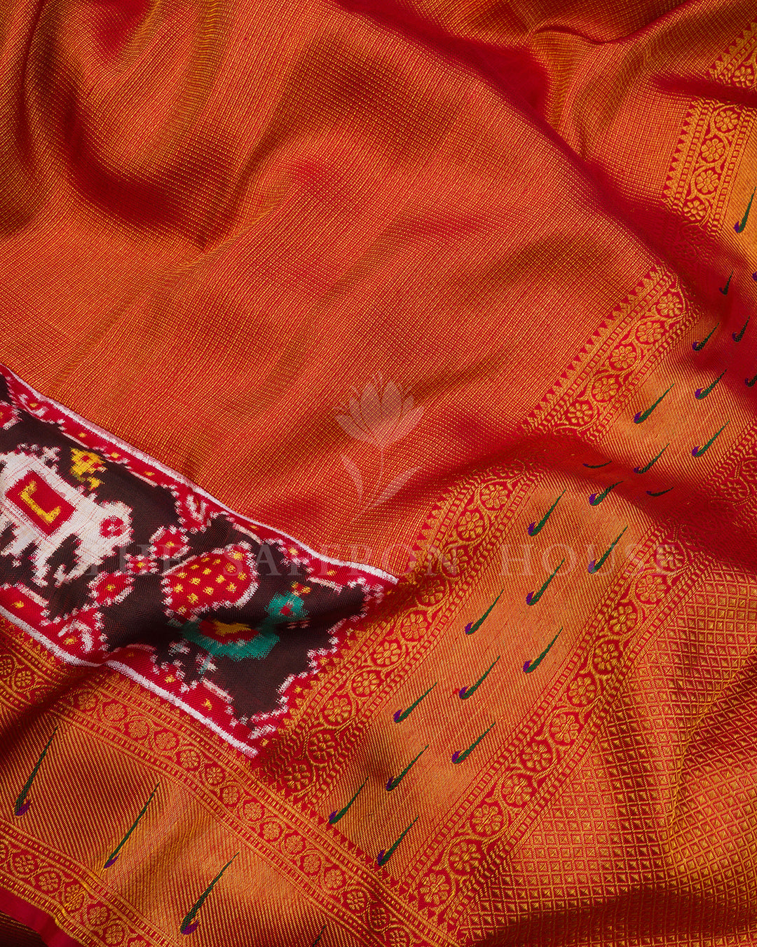 Rust Red Kanchivaram Silk Saree with Ikat Elephant-Peacock Panel & Peacock Feather Border