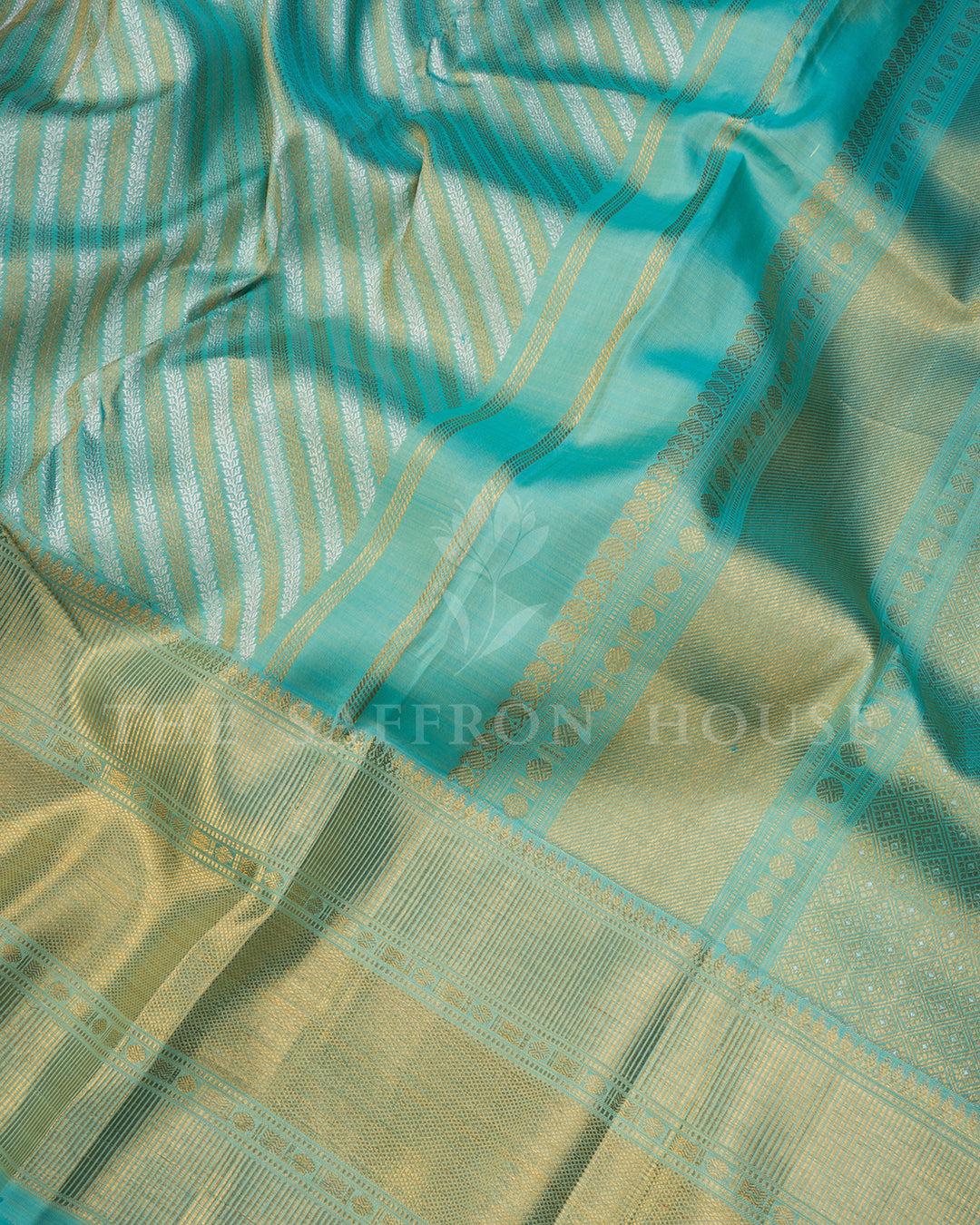 Sky Blue Kanchivaram Silk Saree with Diagonal Gold Zari Stripe Weave & Wide Textured Border