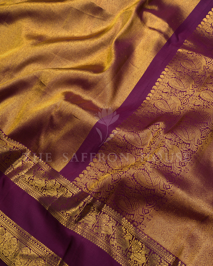 Gold Kanchivaram Silk Saree with Diagonal Zari Texture & Wine Peacock Border