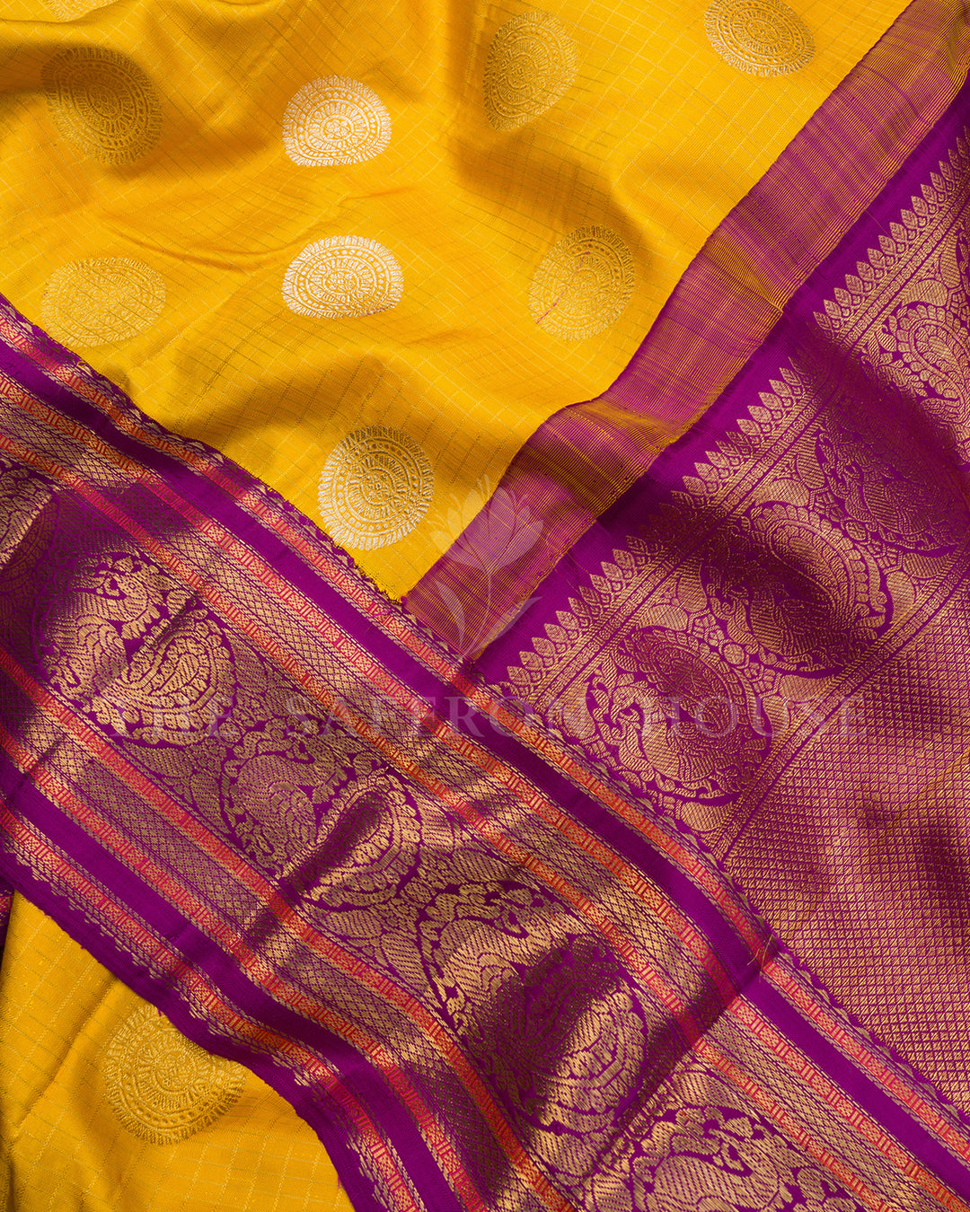 Yellow Kanchivaram Silk Saree with Silver Medallion Buti & Magenta Peacock Border