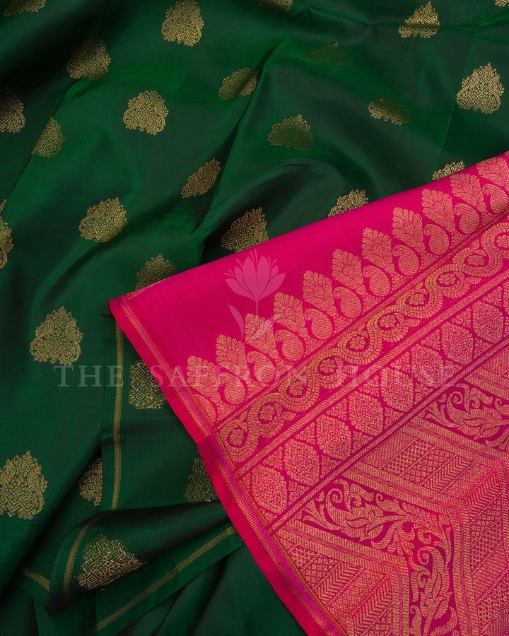 Bottle Green Kanchivaram Silk Saree with Gold Zari Buttis, Pink Pallu with Floral Zari Work