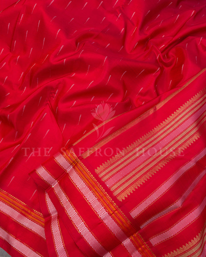 Red Kanchivaram Silk Saree with Silver Zari Buttis, White Zigzag Border