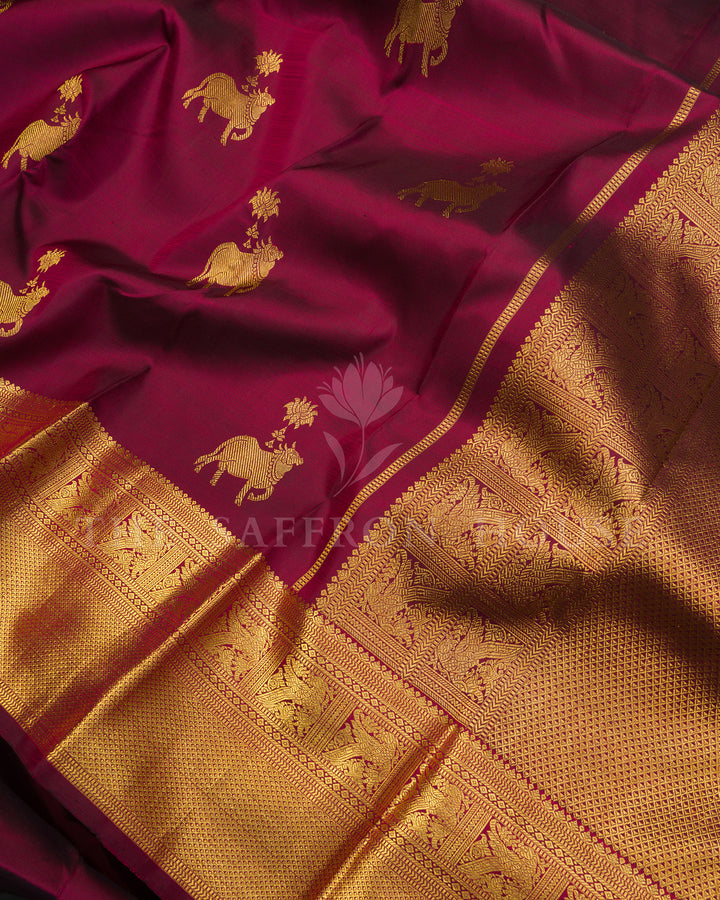Magenta Kanchivaram Silk Saree with Gold Zari Elephant Motifs, Wide Gold Border