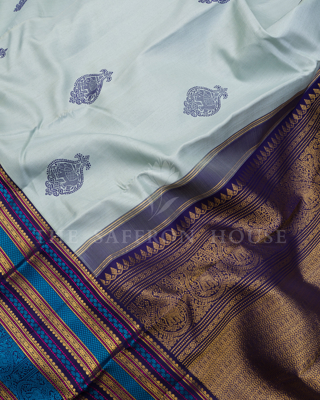 Powder Blue Kanchivaram Silk Saree with Navy Elephant Buttis, Multicolor Border
