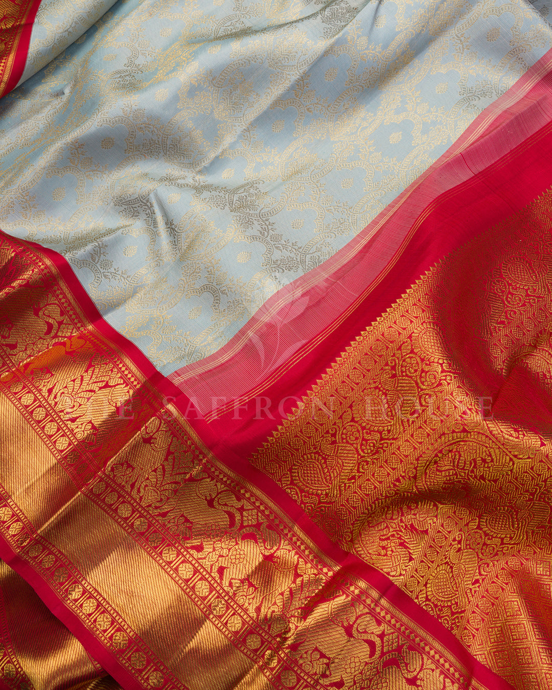 Powder Blue Kanchivaram Silk Saree with Zari Floral Jaal, Red Border with Elephant Motifs