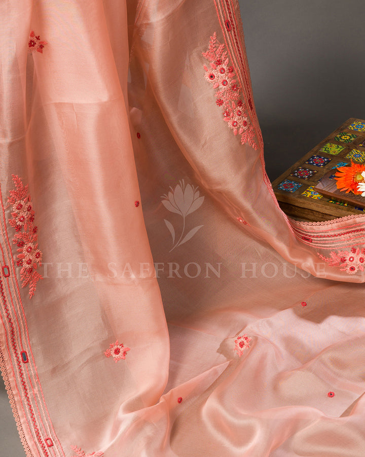 Peach Organza Saree with Floral Thread Embroidery, Mirror Work and Crochet Lace Border