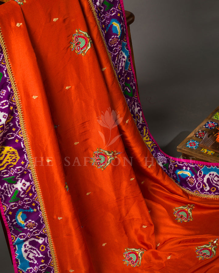 Marigold Orange Tussar Silk Saree with Ikat Fusion Border and Zardosi Buttas