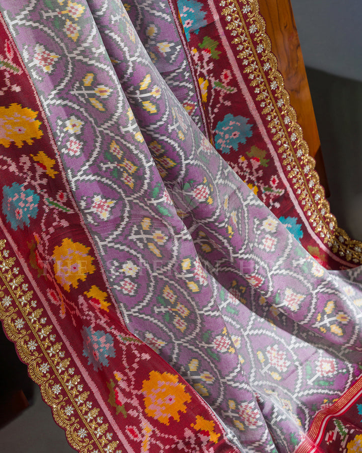 Lavender & Maroon Hand Embroidered Border Ikat Silk Saree
