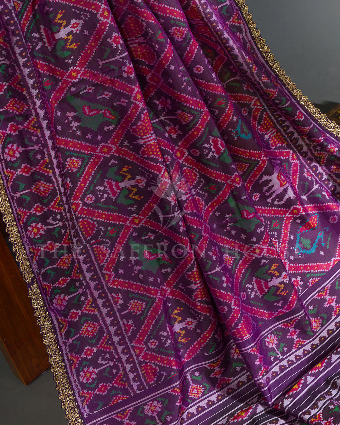 Purple Hand Embroidered Border Ikat Silk Saree