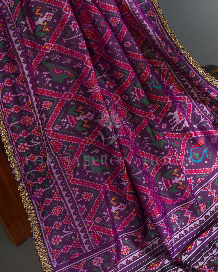 Purple Hand Embroidered Border Ikat Silk Saree