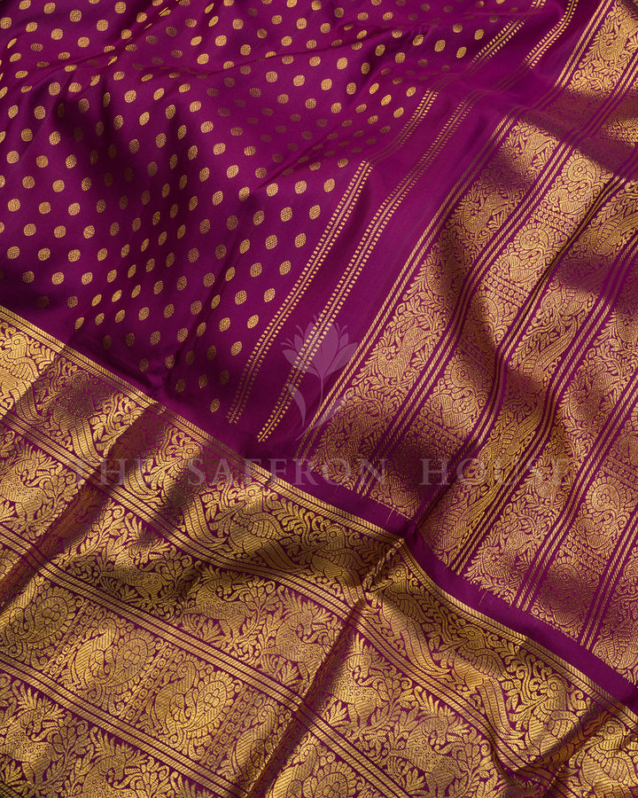 Purple Kanchivaram Silk Saree with Gold Zari Buttas & Peacock Border