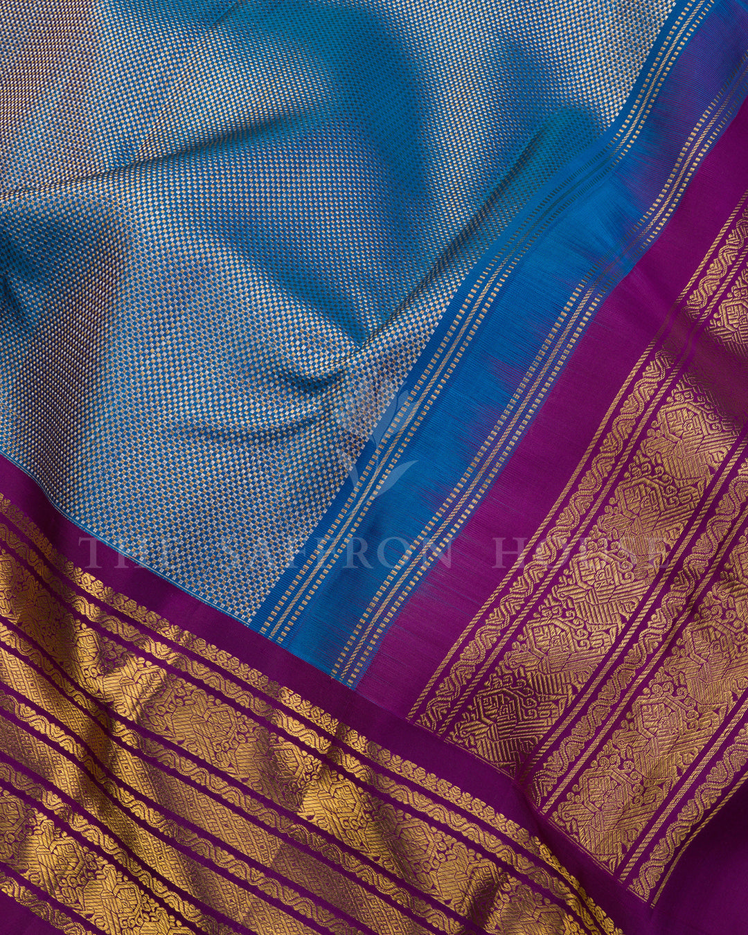 Peacock Blue Kanchivaram Silk Saree with Purple Zari Striped Border