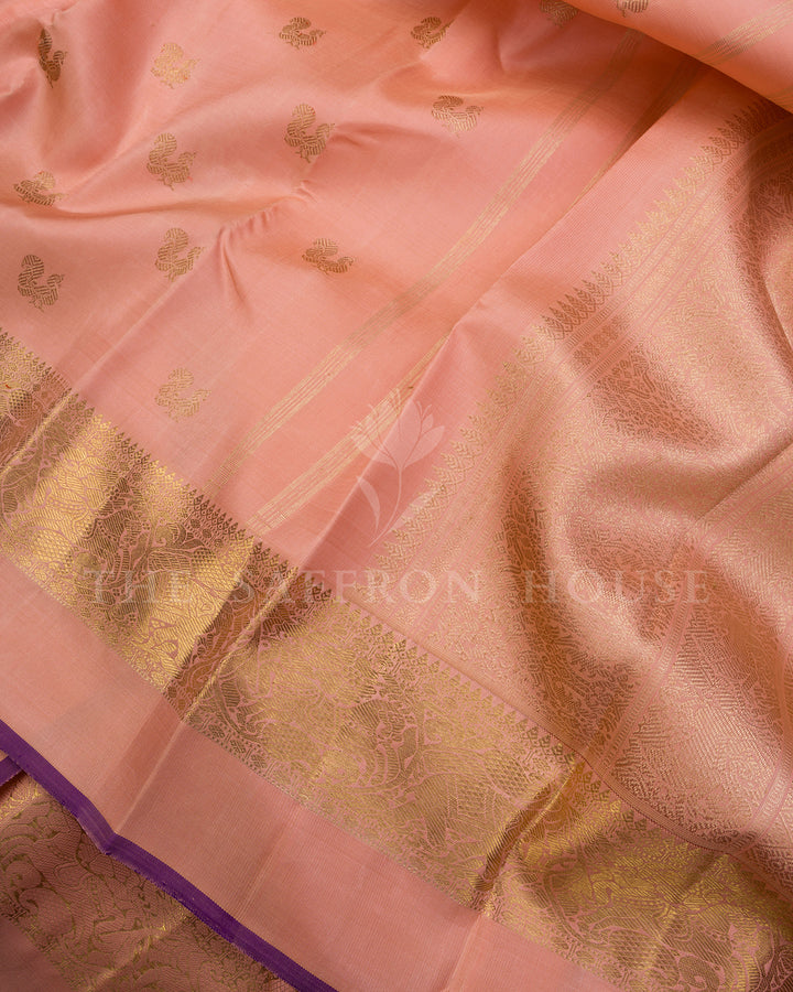 Peach Kanchivaram Silk Saree with Scattered Gold Zari Butis & Peacock Border
