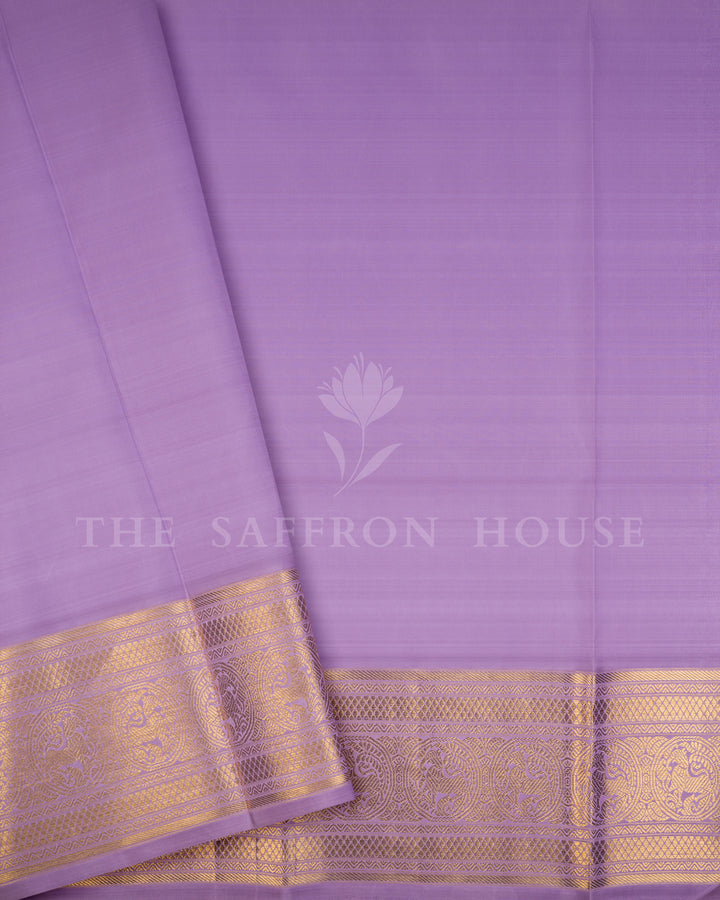 Lavender Kanchivaram Silk Saree with Woven Peacock Motif Border