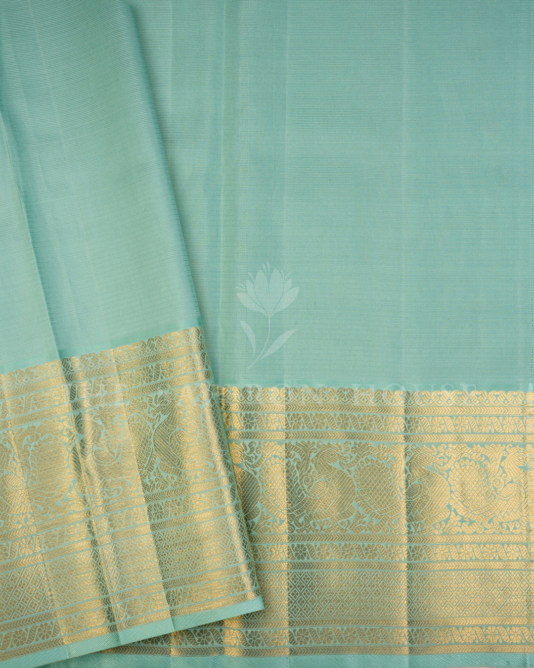 Sea Green Kanchivaram Silk Saree with Diagonal Gold Zari Weave & Peacock Motif Border