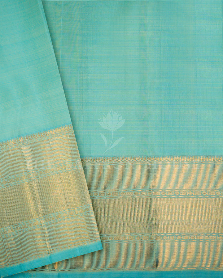 Sky Blue Kanchivaram Silk Saree with Diagonal Gold Zari Stripe Weave & Wide Textured Border