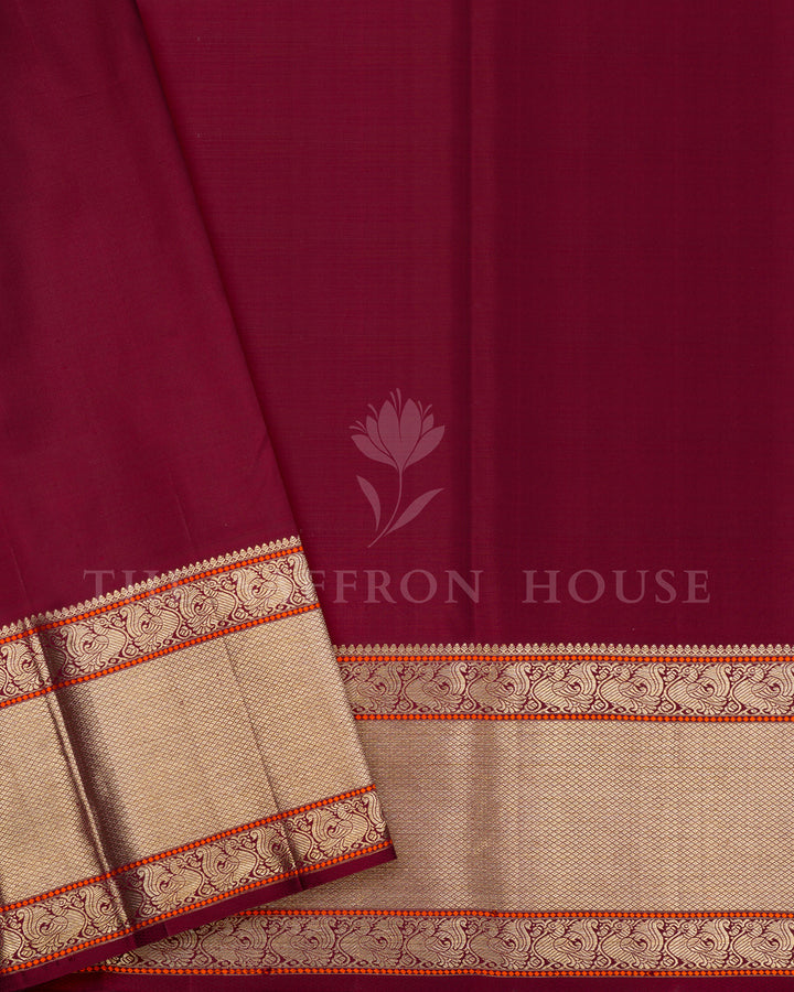 Mint Green Korvai Kanchivaram Silk Saree with Diagonal Zari Texture & Maroon Peacock Border