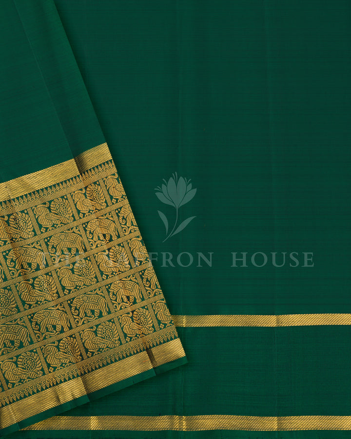 Emerald Green Kanchivaram Silk Saree with Checkered Zari Weave & Gold Elephant Procession Border